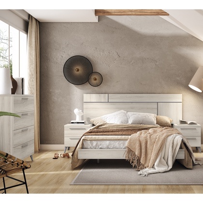 Sistema de dormitorio frontal con cabecero de gran formato y mesillas